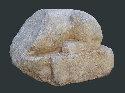 Fragment of the small sphinx from white limestone